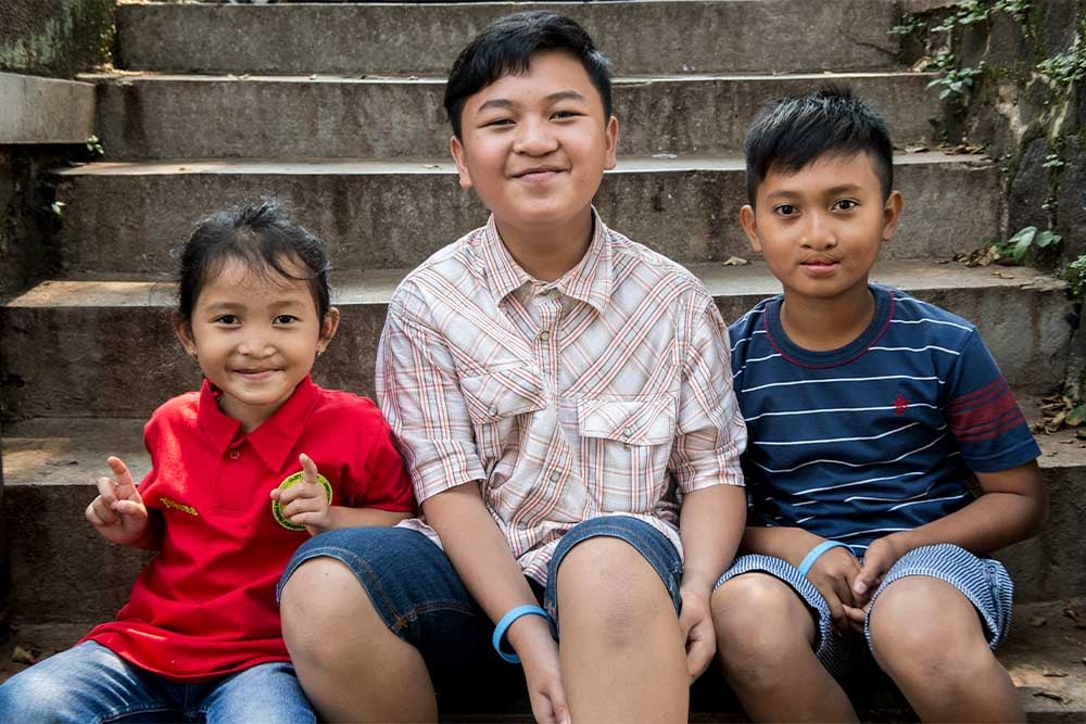 Levi, Wanqsa and Nazwa smiling after their cleft surgeries