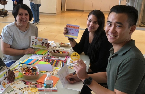 Smile Train supporters smiling and making cards