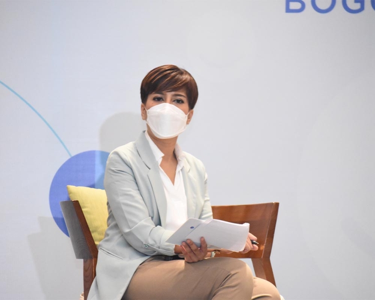 Smile Train 100,000th patient talk show host wearing a mask